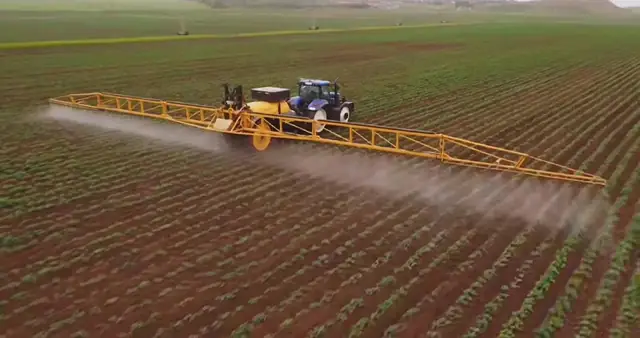 Spraying a potato field, SHER Company